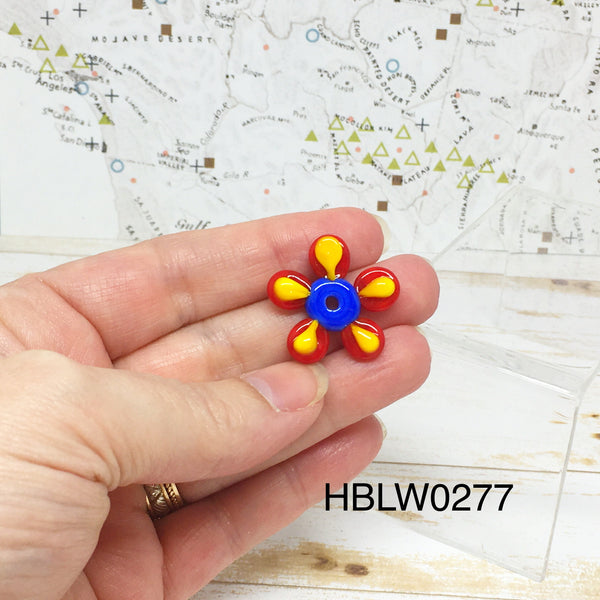 Groovy Red, Blue and Yellow Disc Flower