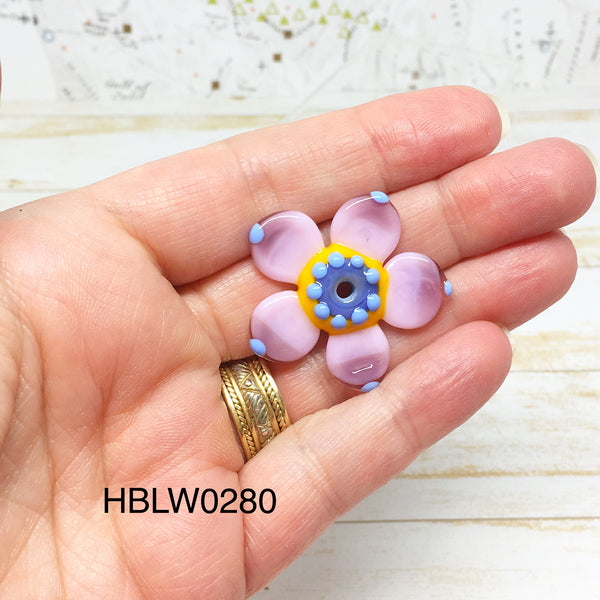 Pink, Yellow and Periwinkle Disc Flower