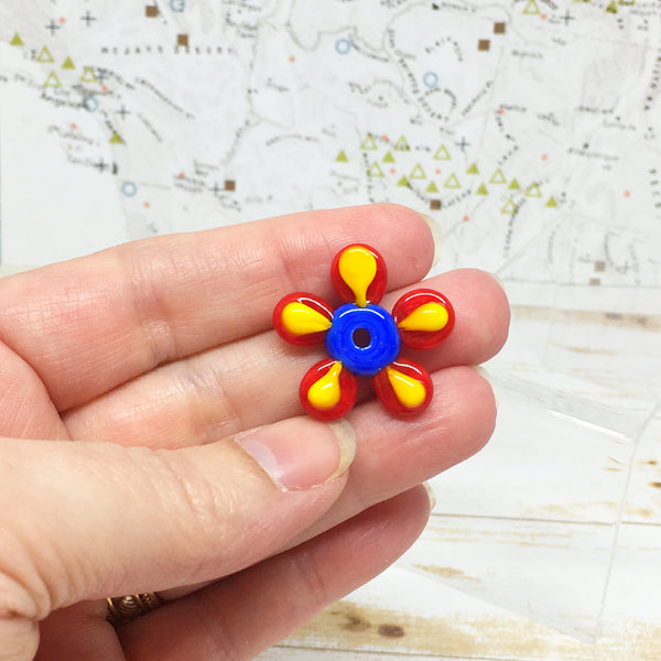 Groovy Red, Blue and Yellow Disc Flower