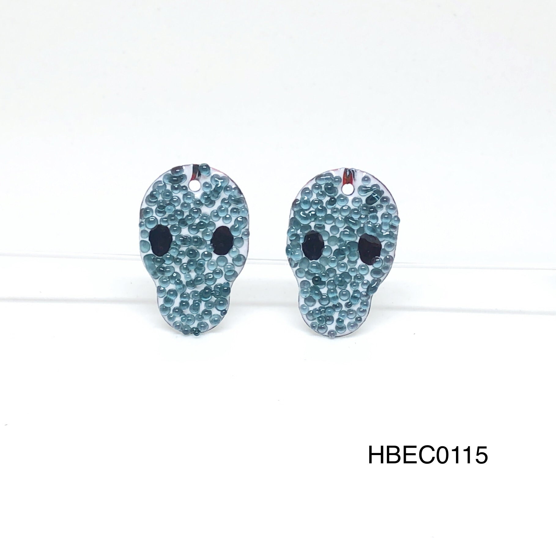 Enameled Components: Skulls with Warts!